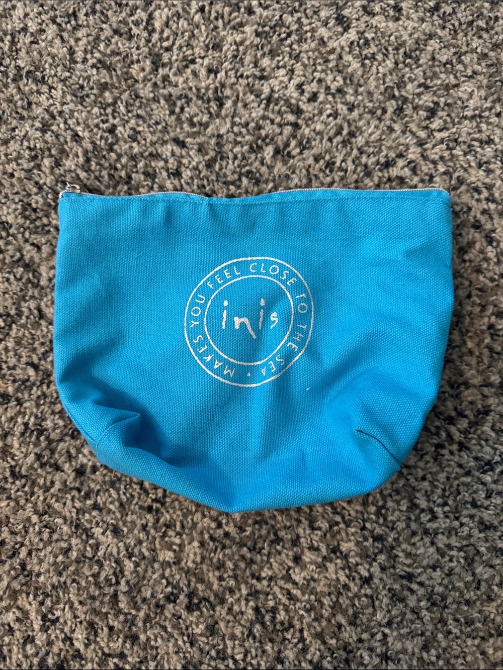 Turquoise Canvas Zip Pouch with White Circular Logo